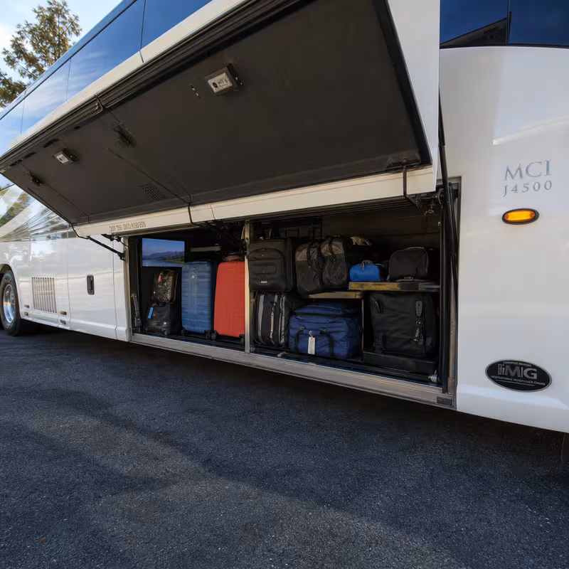 Party bus interior with wraparound leather seating and LED lighting in Little Rock