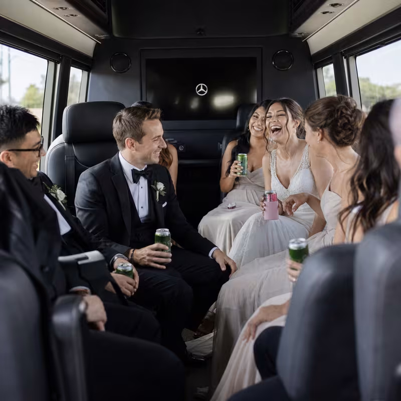Black Mercedes Sprinter van staged for an Little Rock Wedding Transportation group